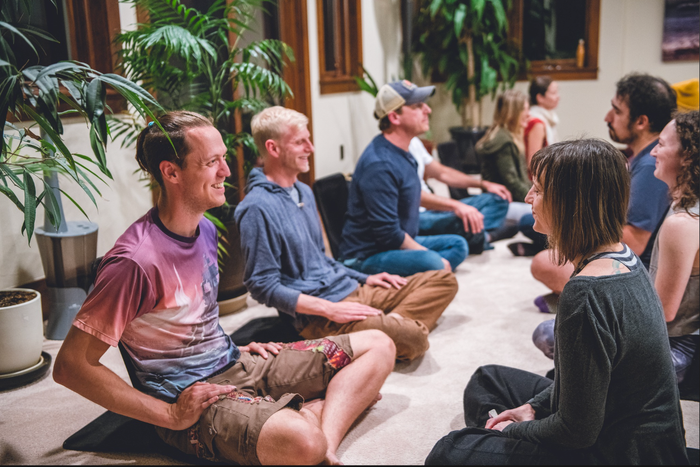 Community gathering with people connecting at an event